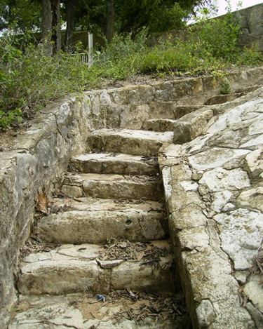 Boerne TX stone steps down Ye Kendall Inn