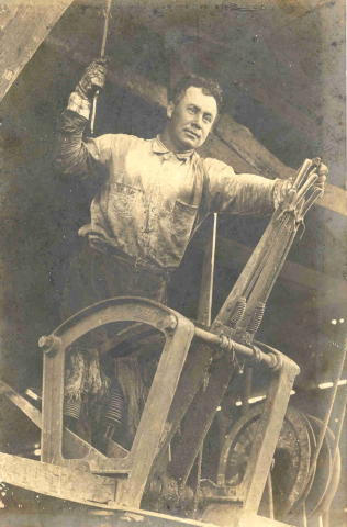 Tx Colorado County - Man operating equipment at Lorraine gravel pit